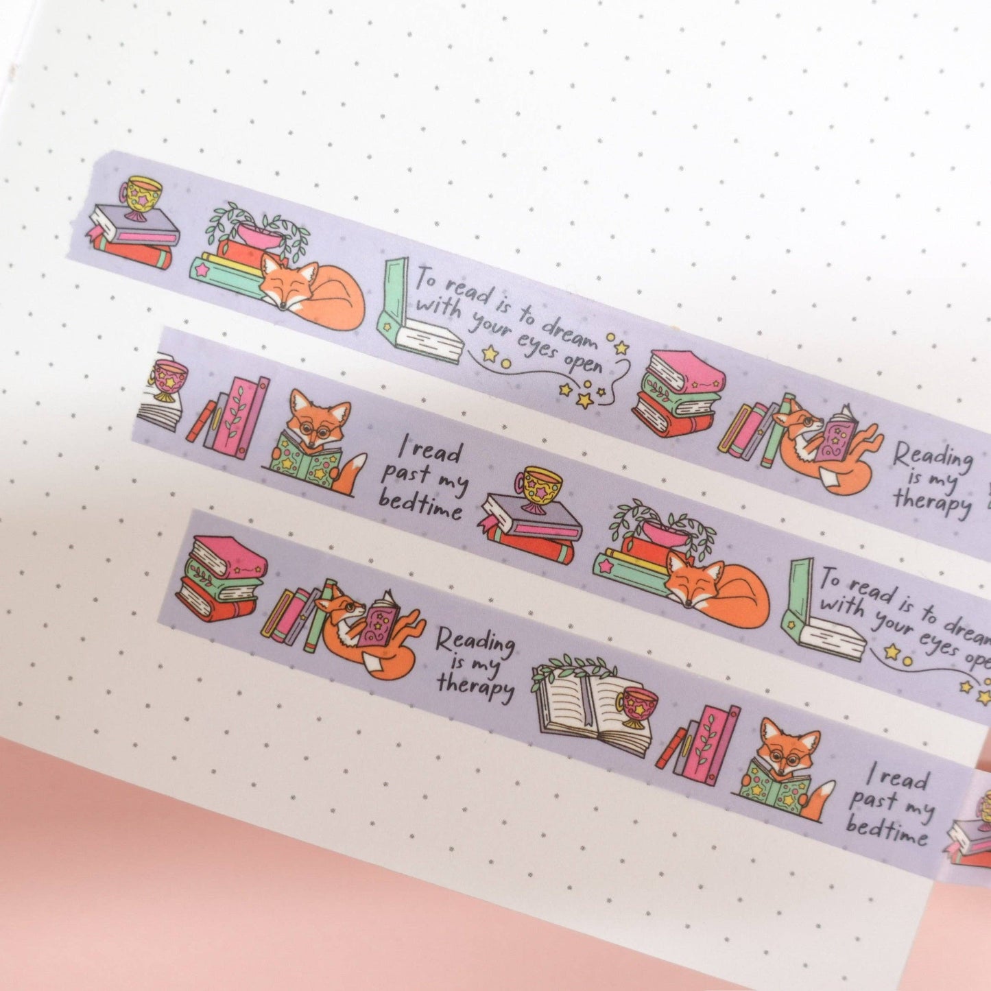 Cosy washi tape with Maple the Fox and bookish illustrations, fun reading quotes, eco-friendly paper packaging—great for planners, crafts, and gifts.