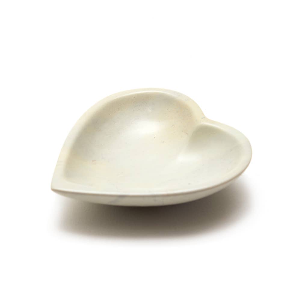 Heart-shaped soapstone jewellery dish, hand carved in Nairobi from sustainable Kenyan stone with natural colour variations.
