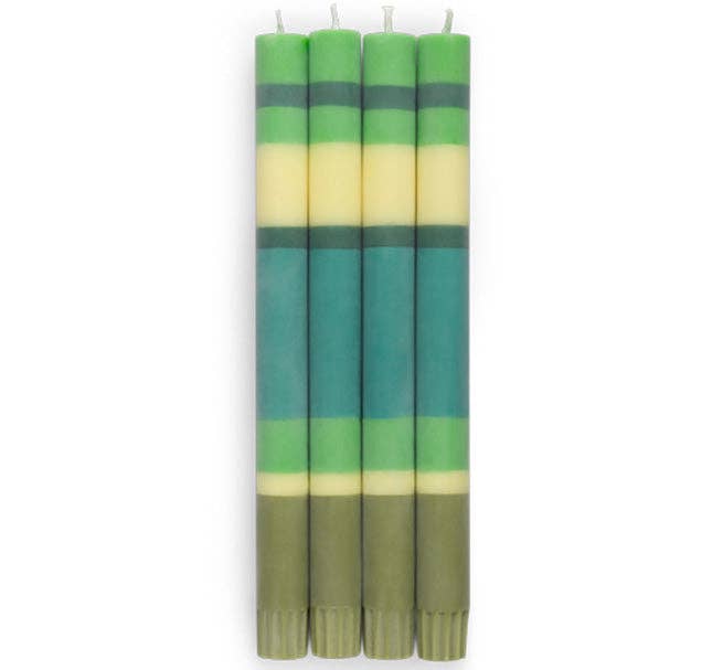 Set of four tall striped eco dinner candles in green tones—Grass, Beryl, Olive & Jasmine—by British Colour Standard, made from sustainable stearin wax with cotton wicks.