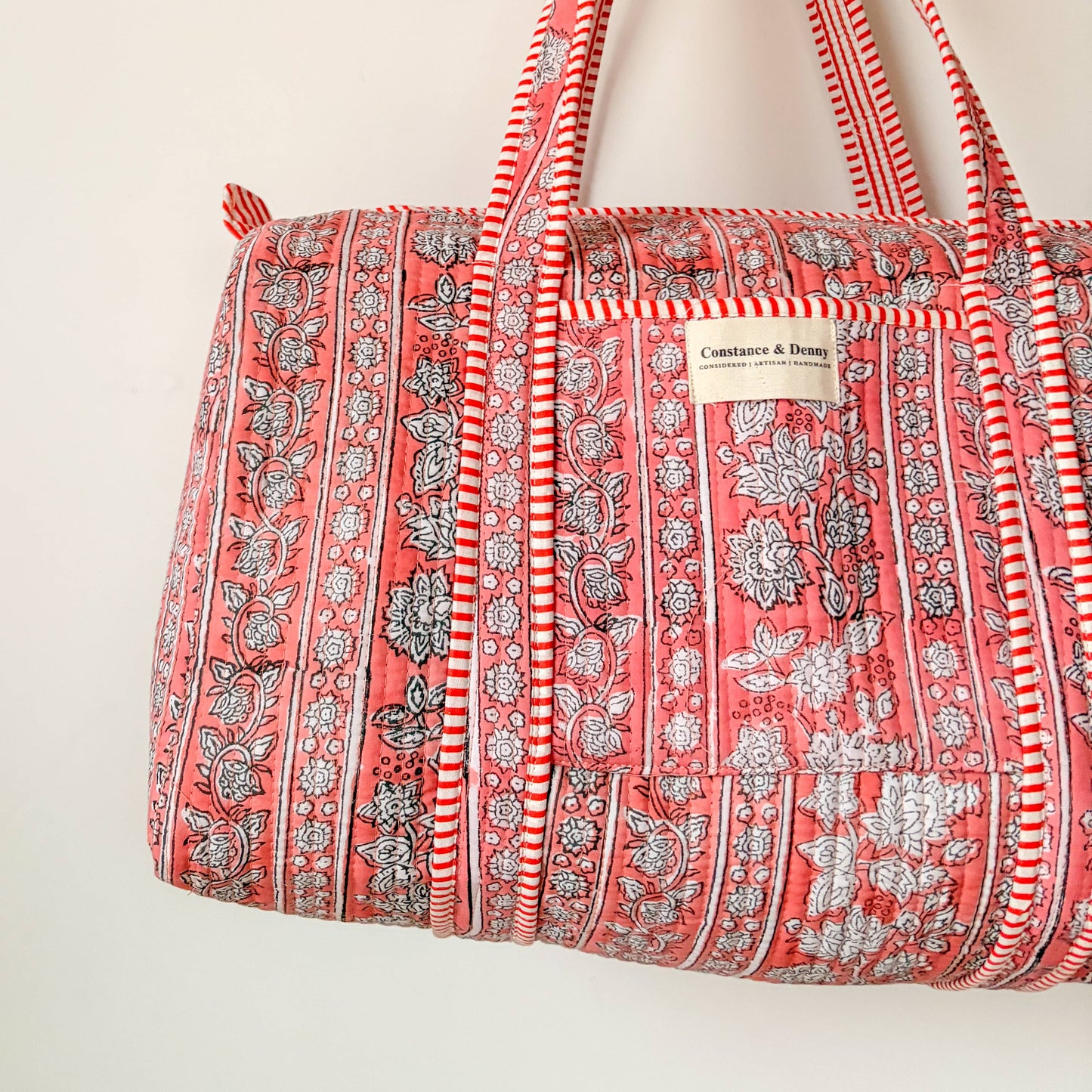 Handmade cotton weekend bag showing striped trim detail