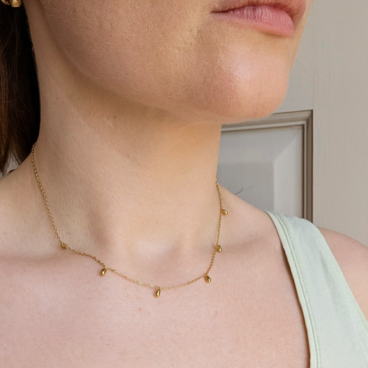 Gold mini droplet necklace layered style