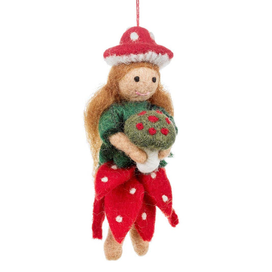 Felted fairy ornament with red mushroom hat and dress on a white background. Handmade felt toadstool fairy autumn hanging decoration with red skirt and hat, sustainable and eco-friendly artisan product.