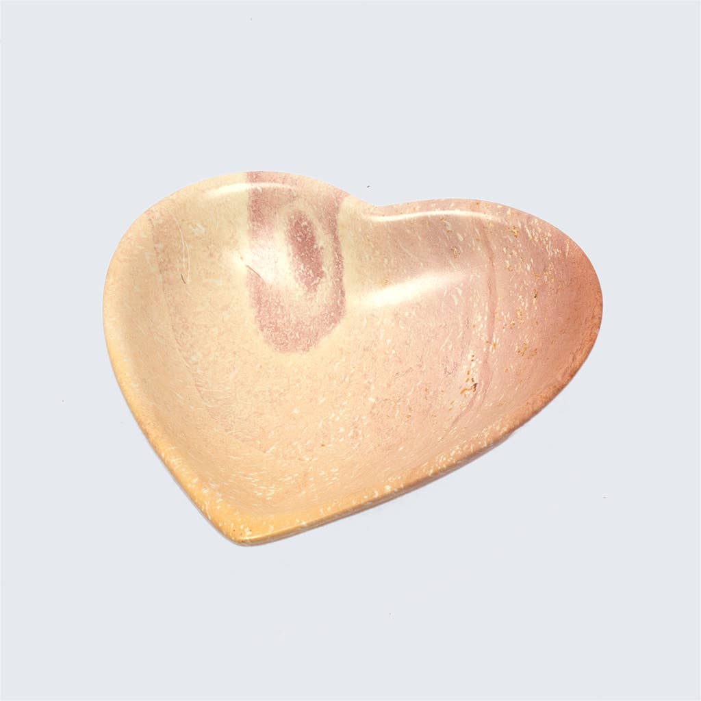 Heart-shaped soapstone jewellery dish, hand carved in Nairobi from sustainable Kenyan stone with natural colour variations.