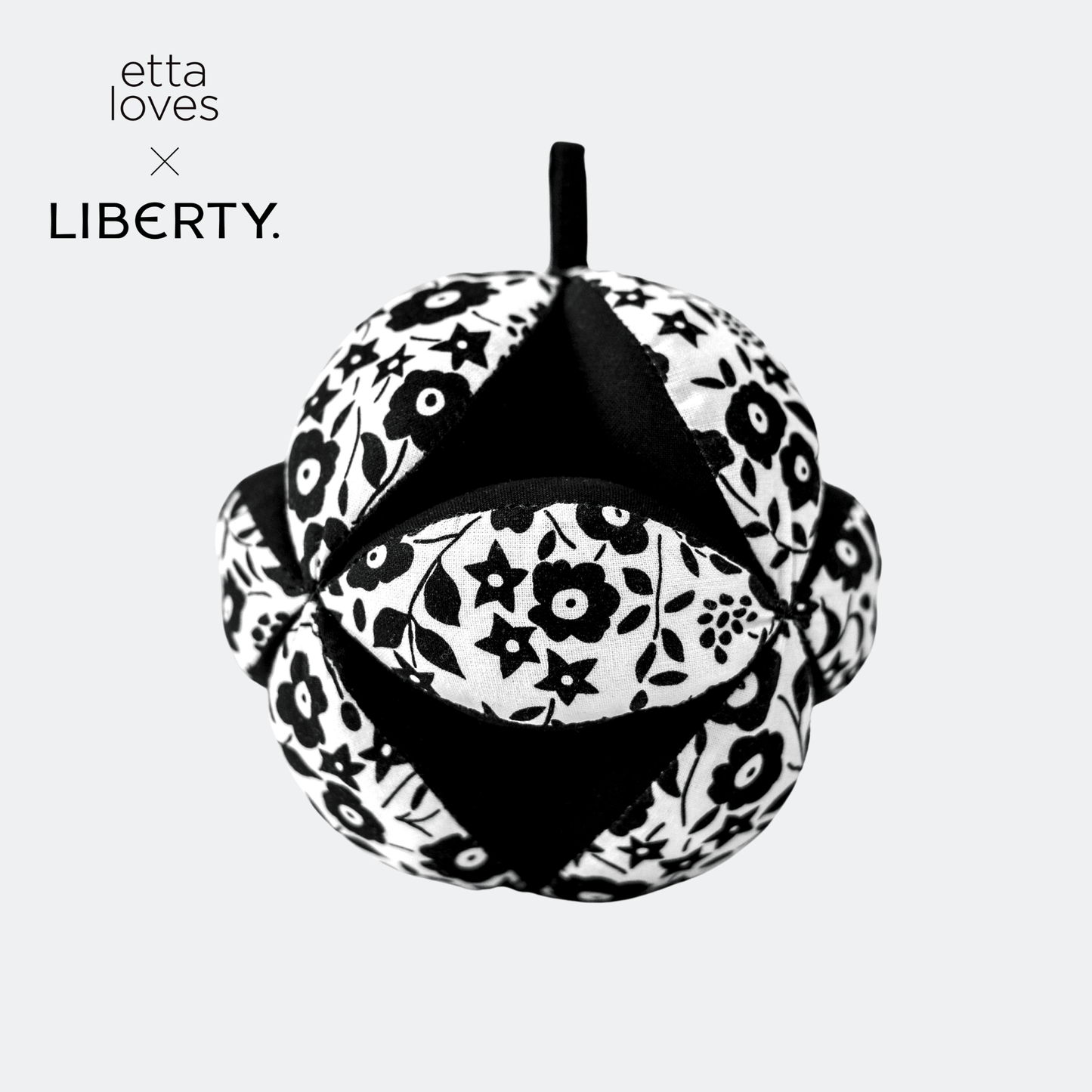Etta Loves x Liberty sensory grasp ball hanging on baby gym