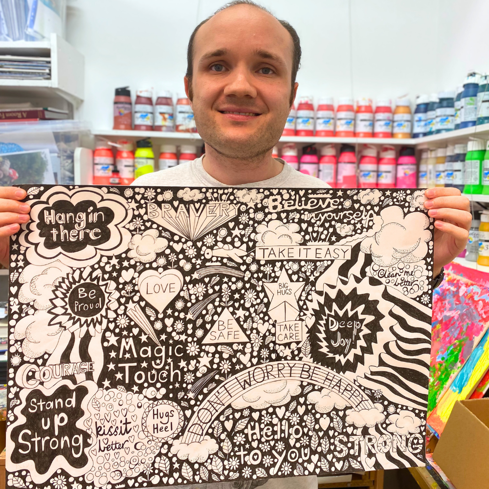 Joy Sized: Be Happy salted caramel milk chocolate bar with pistachio crumb, wrapped in recyclable paper featuring Jack Churchyard’s artwork.