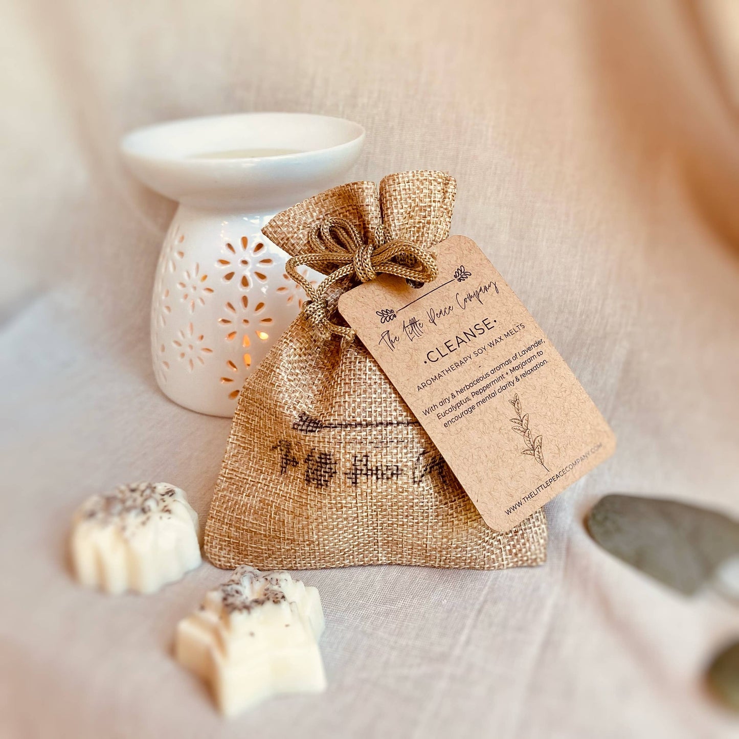 Soy Wax Cleanse Wax Melts - Lavender, Eucalyptus, Peppermint + Marjoram. Airy, herbaceous, and woody aromas which encourage mental clarity and relaxation. Contains 5 x large aromatherapy wax melts in a reusable burlap bag. Hand poured in small batches in our Derbyshire studio