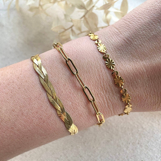 Close-up of 18k gold plated long link chain bracelet on a wrist, highlighting its polished finish and durable, hypoallergenic design. 17cm length.