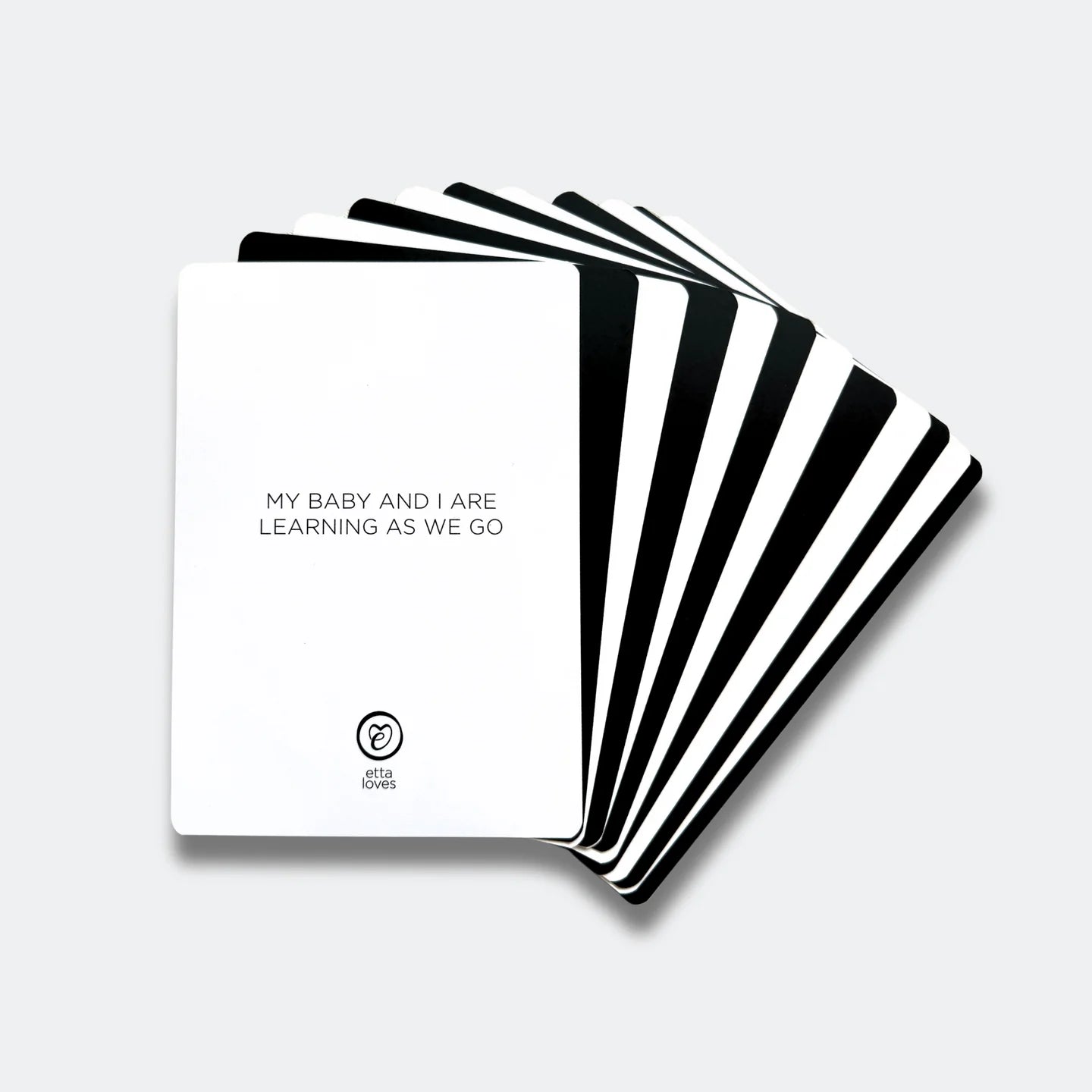 Etta Loves sensory flashcard set with black-and-white high contrast patterns and affirmations on the reverse, in recyclable UK-made packaging.