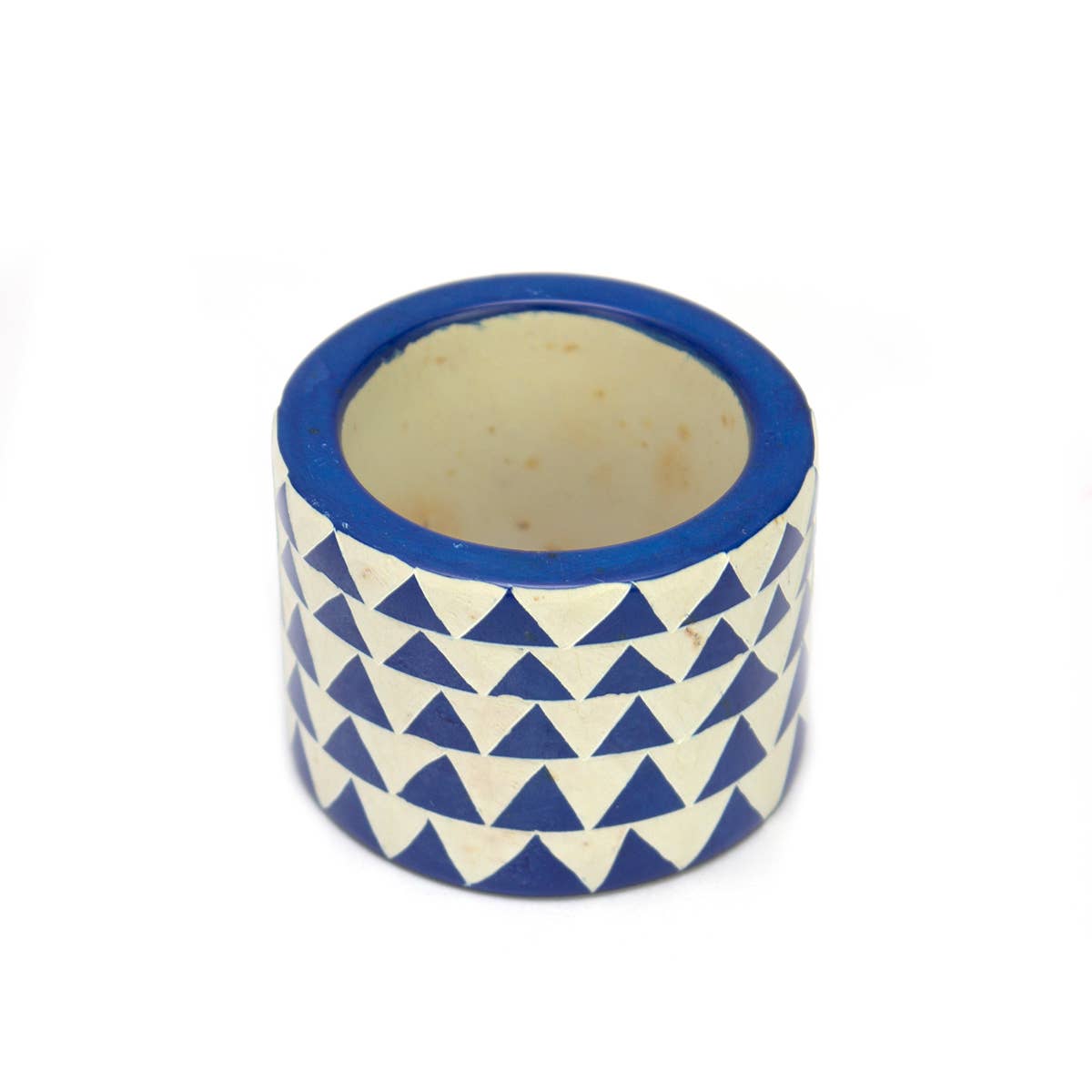 Hand carved blue triangle soapstone napkin ring, crafted in Kisii, Kenya with natural colour variation, African artisan-made dining accessory.