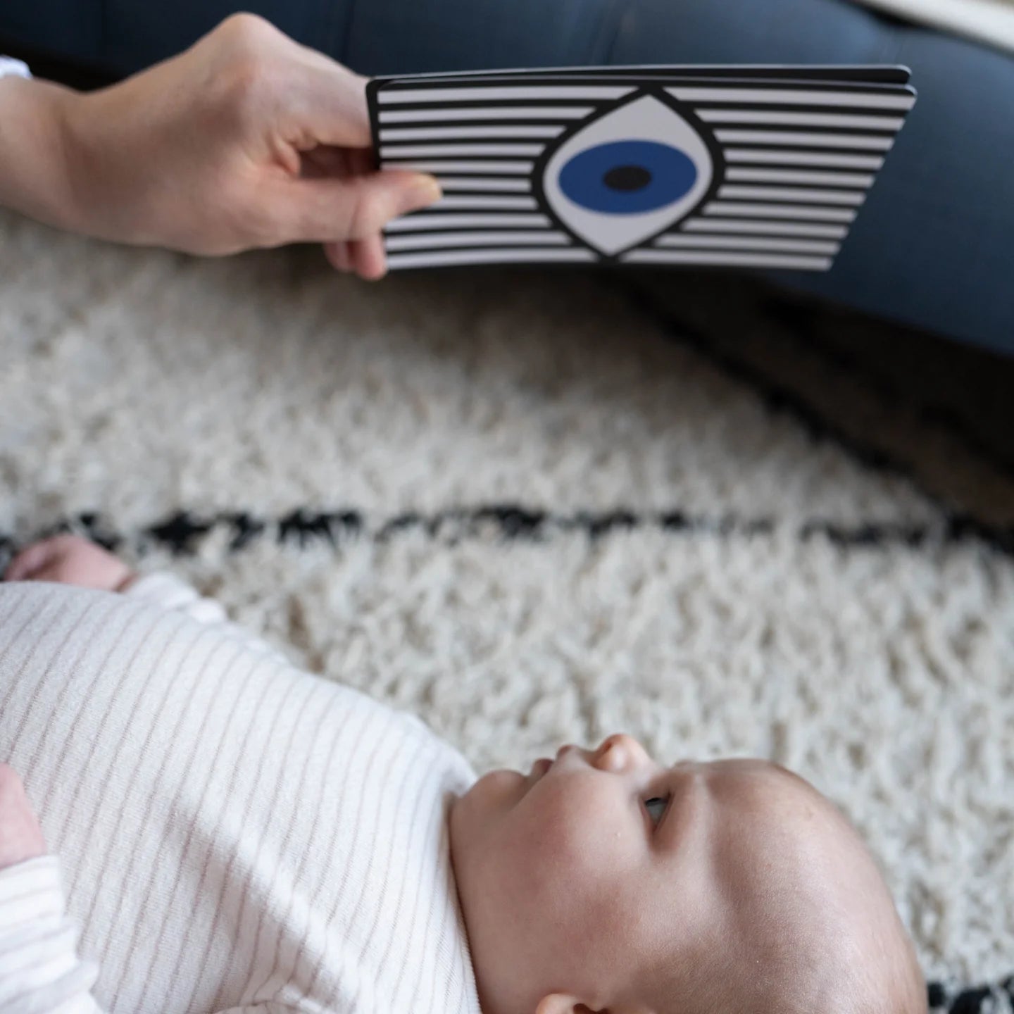 Etta Loves sensory flashcard set with black-and-white high contrast patterns and affirmations on the reverse, in recyclable UK-made packaging.