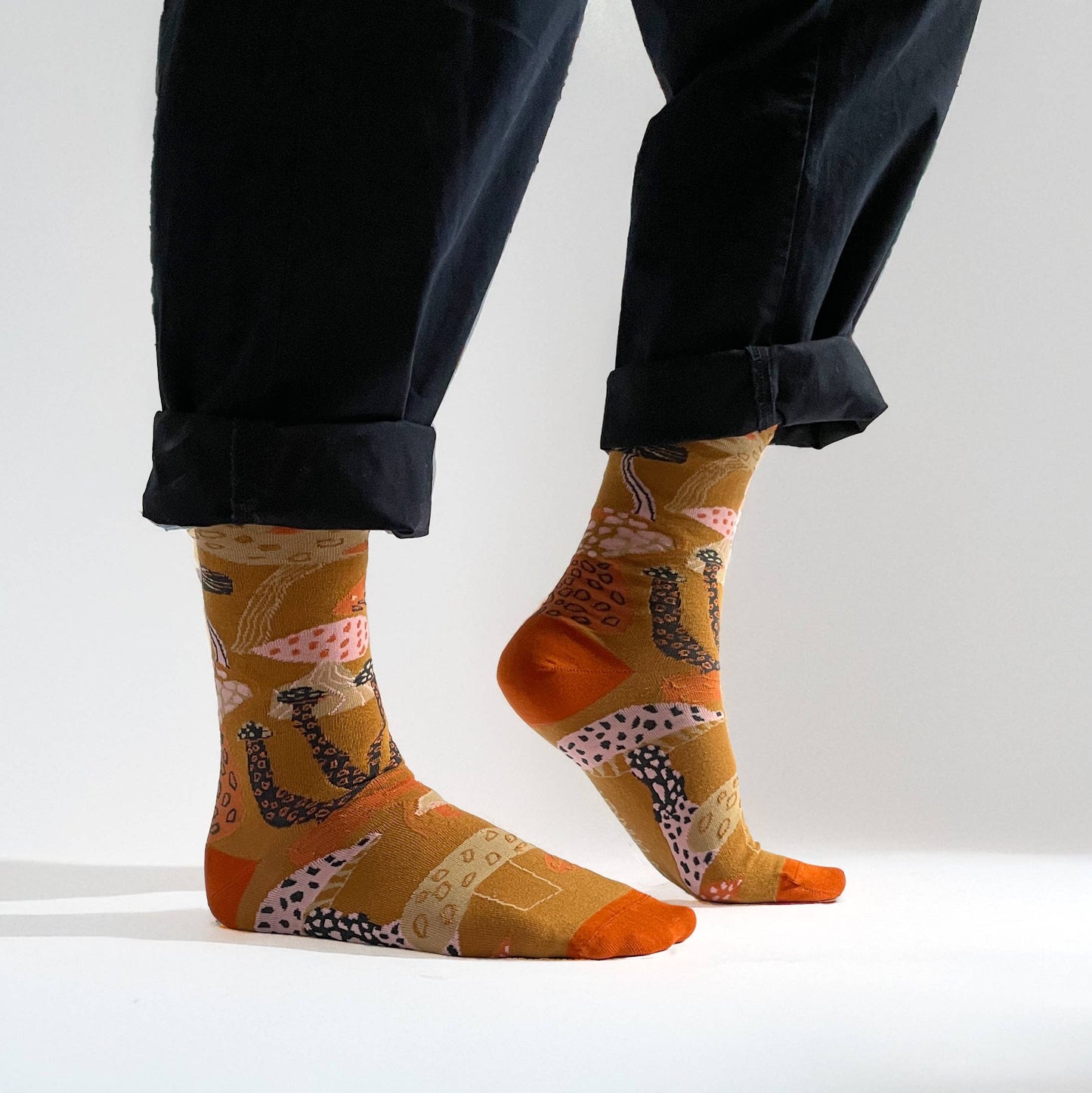 James Barker Mushroom socks in five colours, illustrated nature pattern, made from combed cotton.
