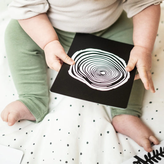 Close-up of Etta Loves sensory flashcards, showing intricate black and white patterns designed for newborn visual stimulation.