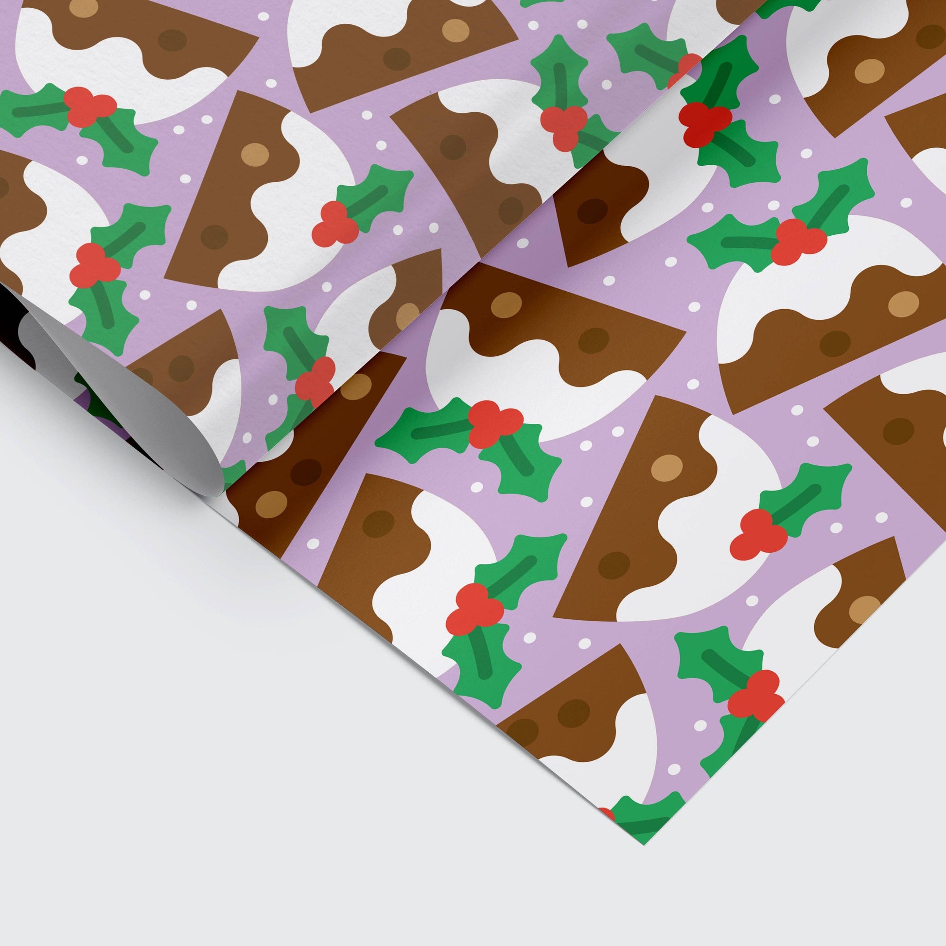Christmas pudding holiday gift wrap sheet by Studio Boketto, bold illustration on snowy lilac background, sustainable certified paper, UK made