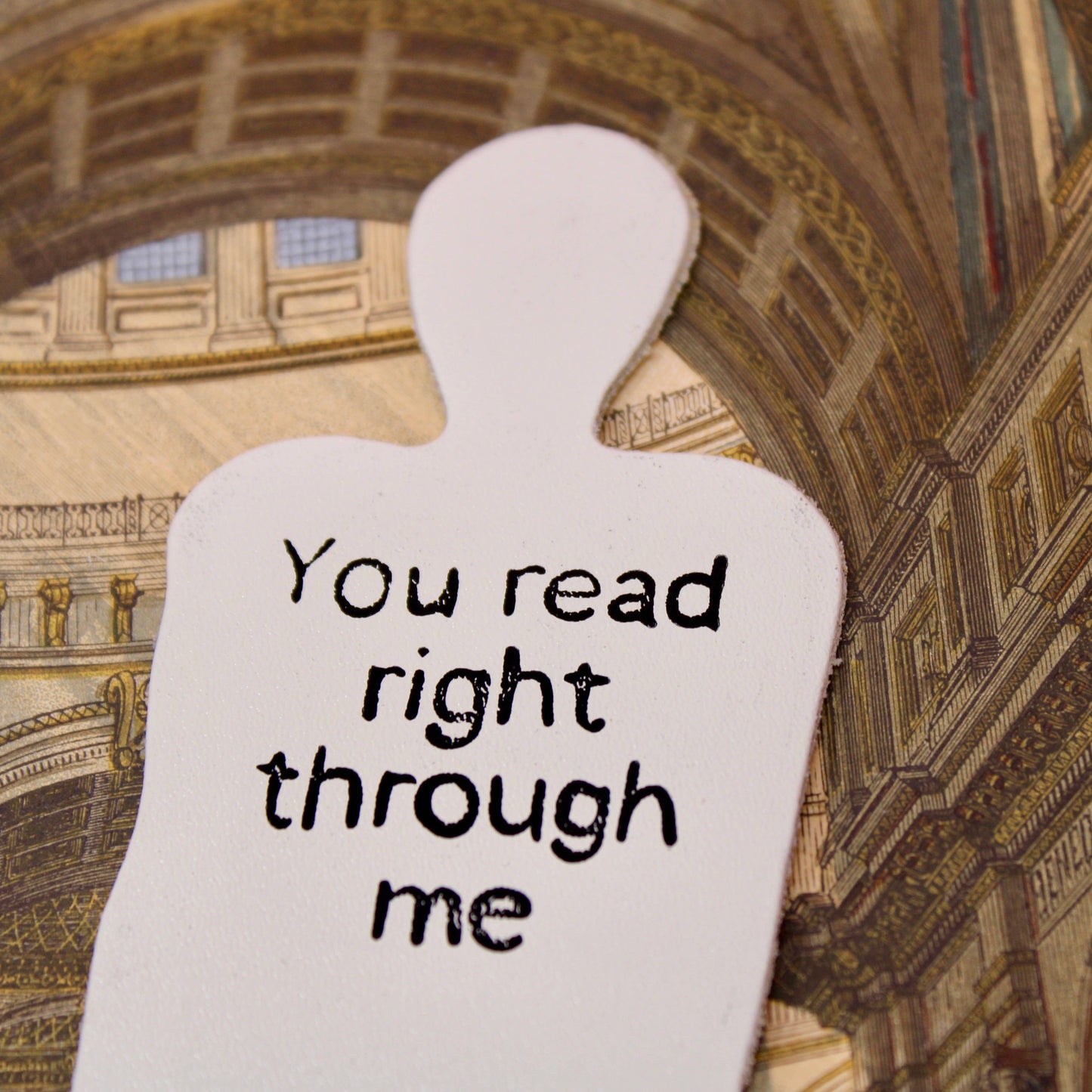A spooky skeleton leather bookmark embossed with ‘You read right through me’ on the reverse.