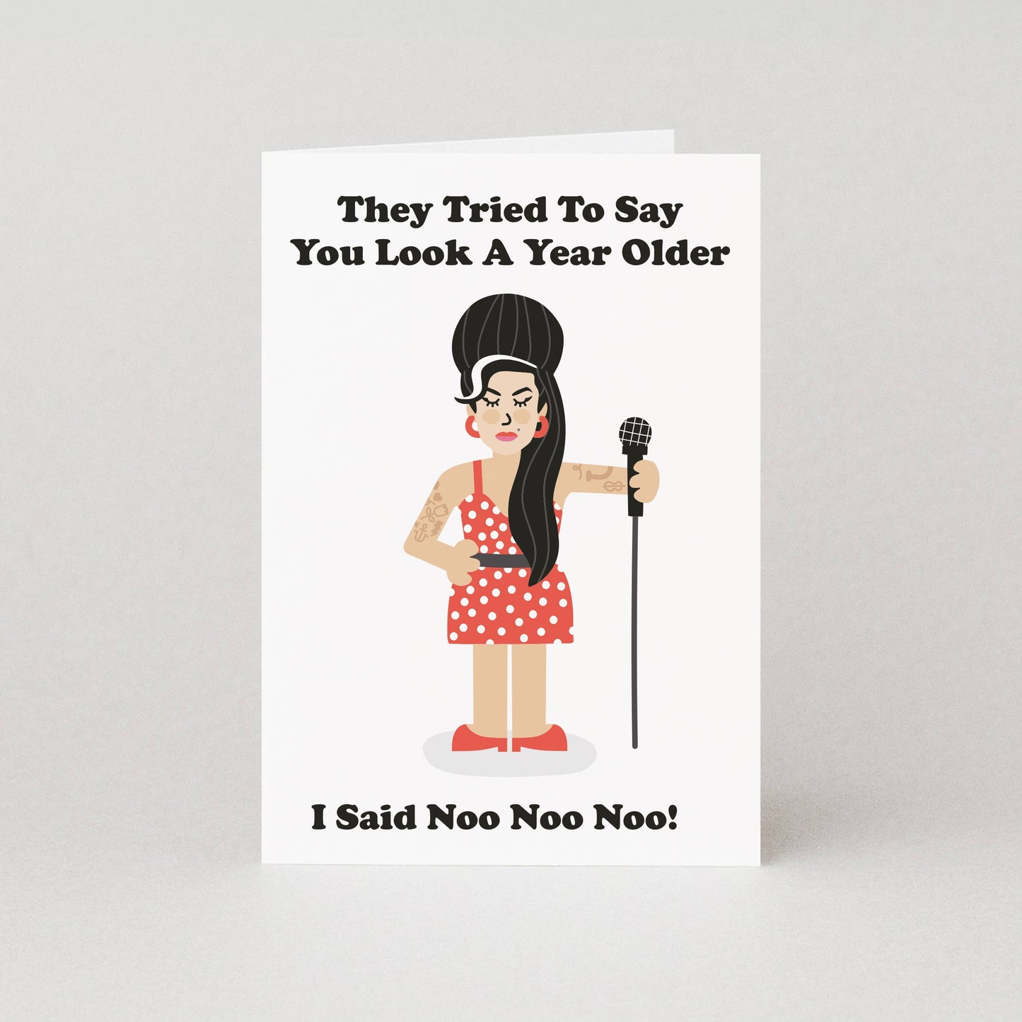 This birthday card features an illustration of a famous blues singer taking a twist on her classic, changing the lyrics to "They Tried To Say You Look A Year Older, I said Noo Noo Noo!", resulting in a perfect gift for fans of the late singer. The birthday card for her is blank on the inside, ready to pen a personal handwritten message.