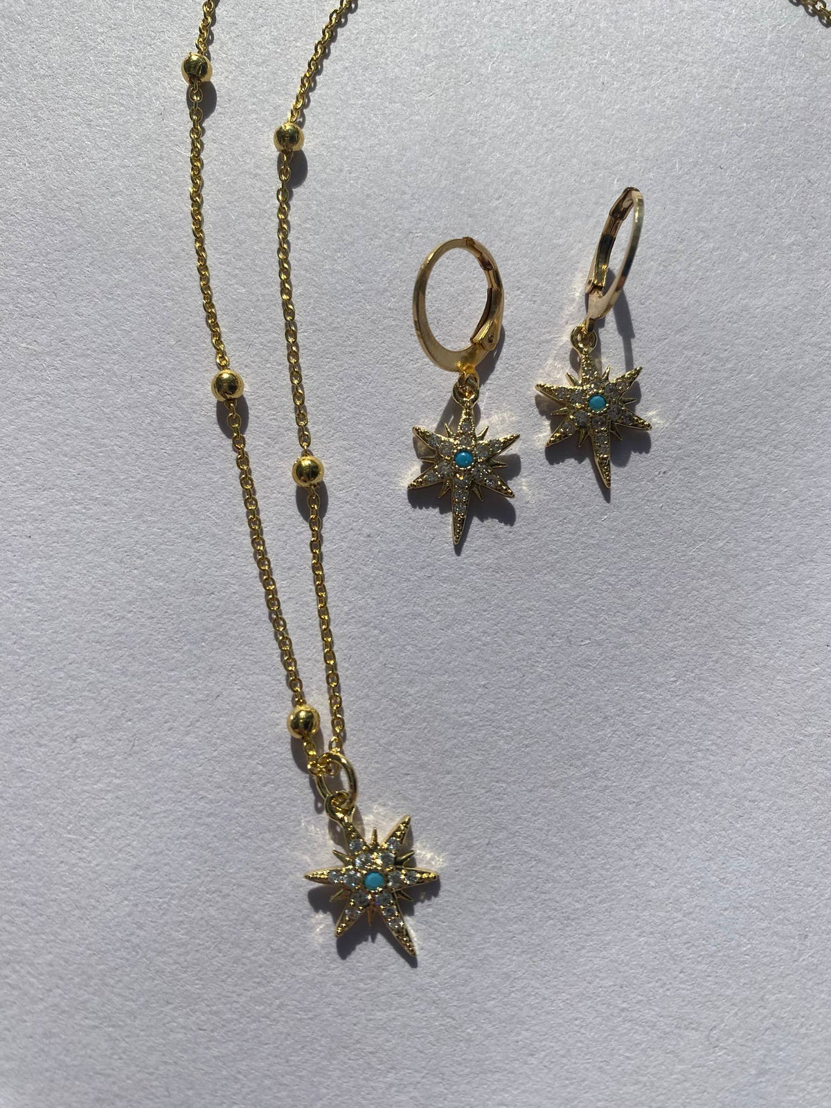 Sustainably packaged gold star huggie hoop earrings