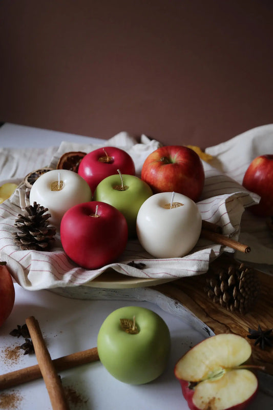 Hand-poured vegan apple candle on decorative tray