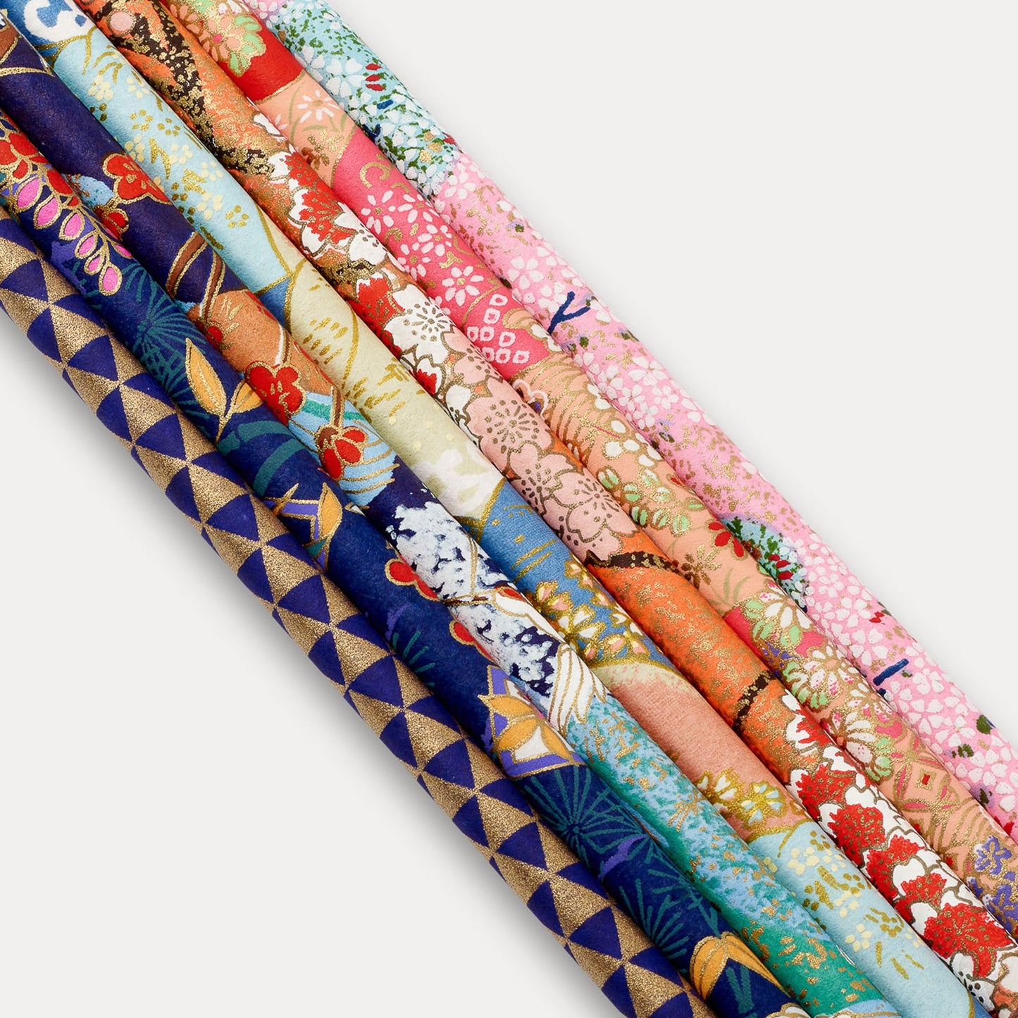 An assorted luxury set of pencils. All covered by hand with a Japanese silk-screen printed paper by family run studios in Kyoto.