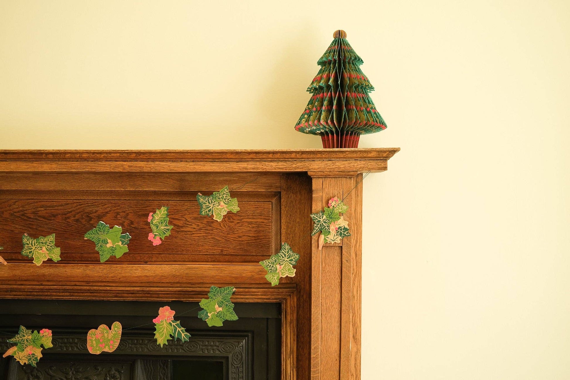 Hand screen printed Holly and Ivy Sewn Garland by East End Press on recycled paper with cotton thread