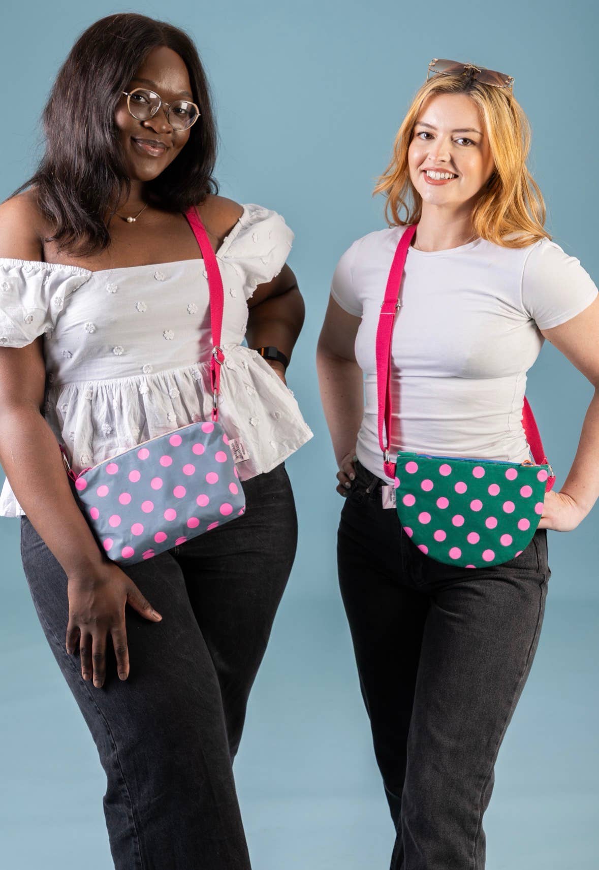 Pink and blue polka dot crossbody boxy bag being worn