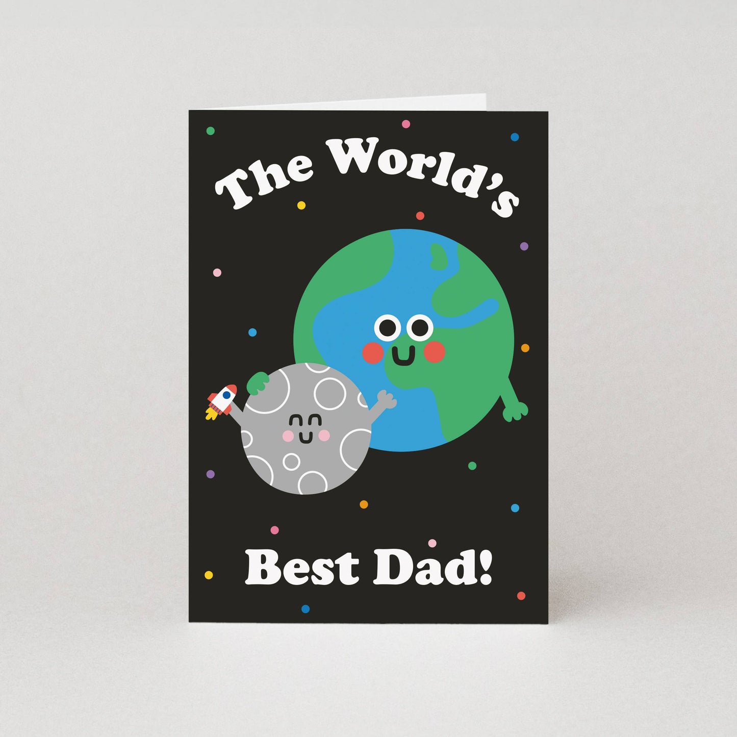 Celebrate the "World's Best Dad" with a cosmic Father's Day Card! The dark expanse of space is home to Earth and the moon (holding a small rocket) who are enjoying a fabulous trip through the cosmos together on this Dad birthday card. The inside of the greeting card is blank, ready for a personal message sharing gratitude for your paternal figure.