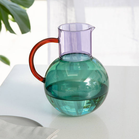Close-up of Pablo Glass Jug's unique exaggerated curves and borosilicate glass