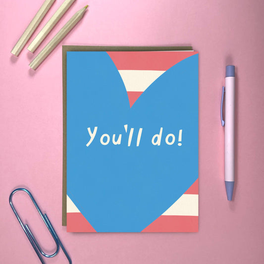 Close-up of 'You'll Do' Valentine's card, showing premium 350gsm textured card stock and Kraft envelope