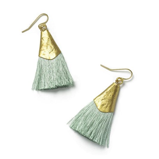 Close-up of mint green Kiara Tassel Earrings, made with recycled brass & sari threads.