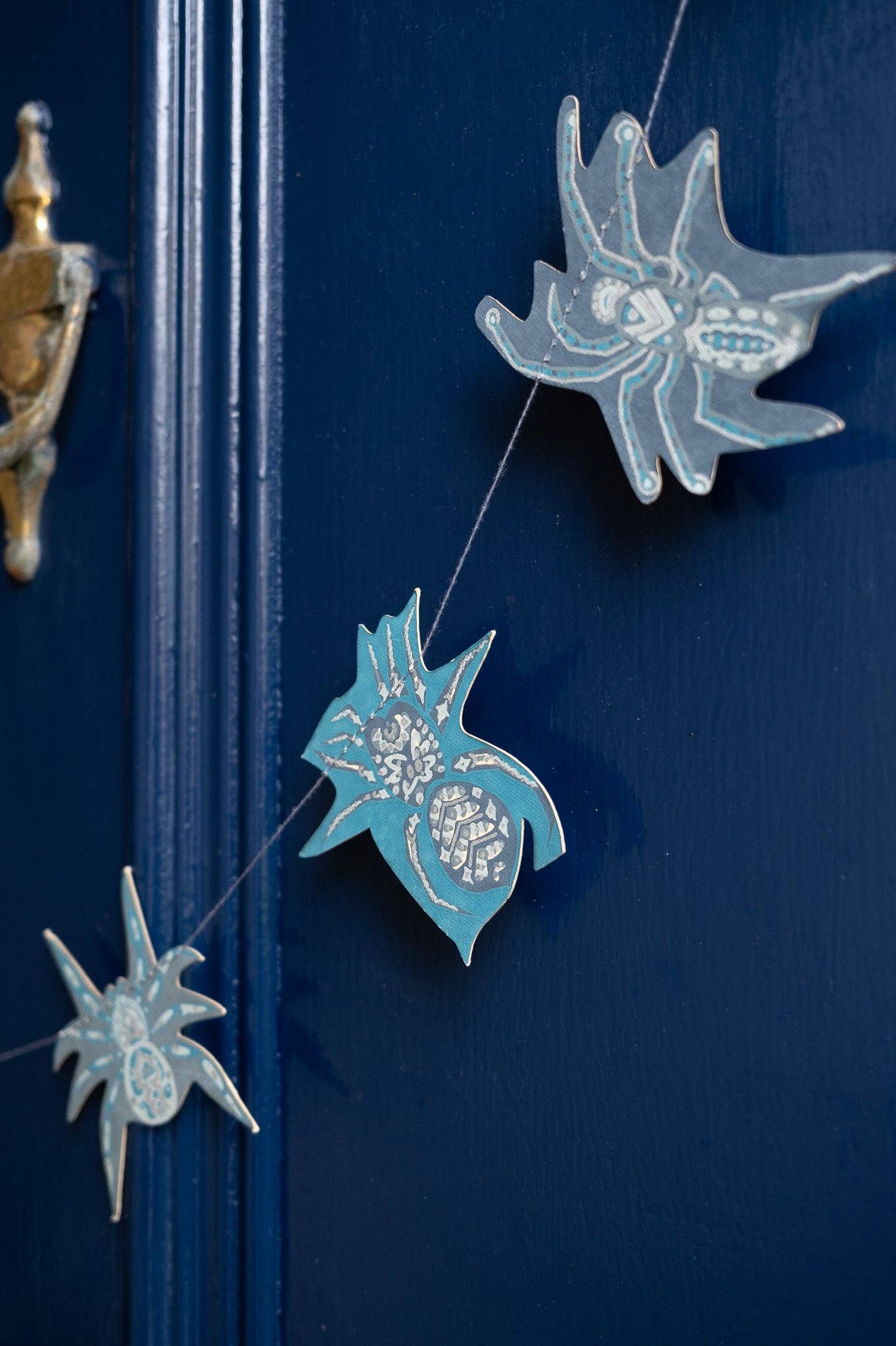 Hand-sewn recycled Halloween garland with 20 spooky screen-printed spiders