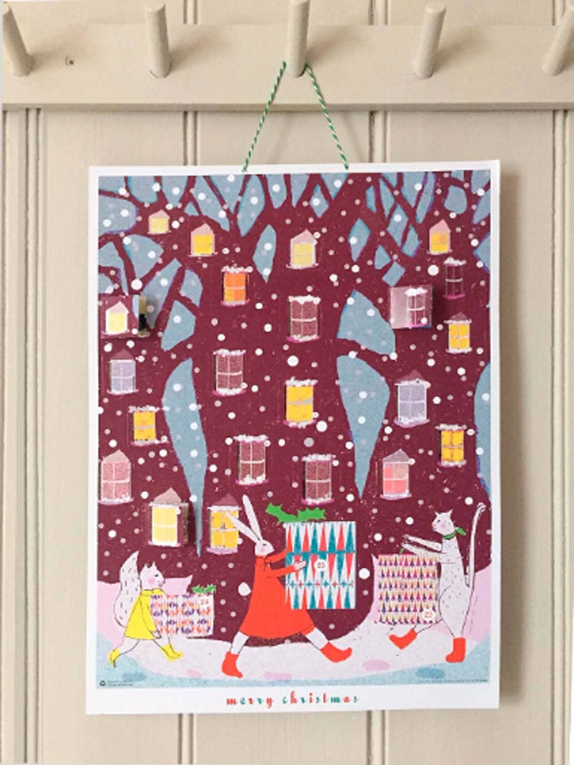 A3 Advent Calendar illustrated by Wini Tapp with 25 woodland Christmas vignettes, hanging ribbon and padded protection