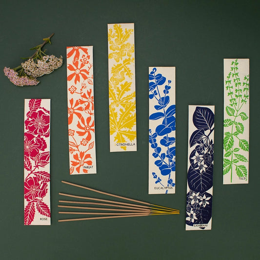 Luxury incense sticks in eco-friendly recycled paper packaging with botanical hand screen-printed design, handmade in India by disabled artisans.