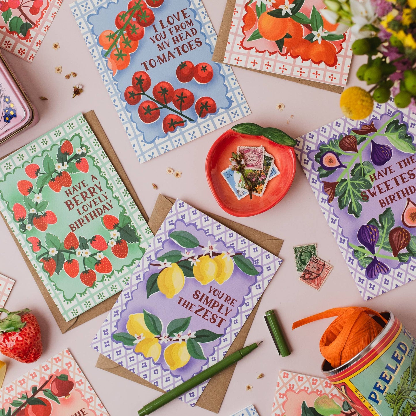 Hand drawn lettering reads 'Have the sweetest birthday'. Part of the on trend Palermo Picnic range, inspired by Italian fruits. Illustrated greeting card with tile pattern and figs illustration, printed onto premium textured card with a kraft envelope. Shown with other designs from the same Palermo collection.