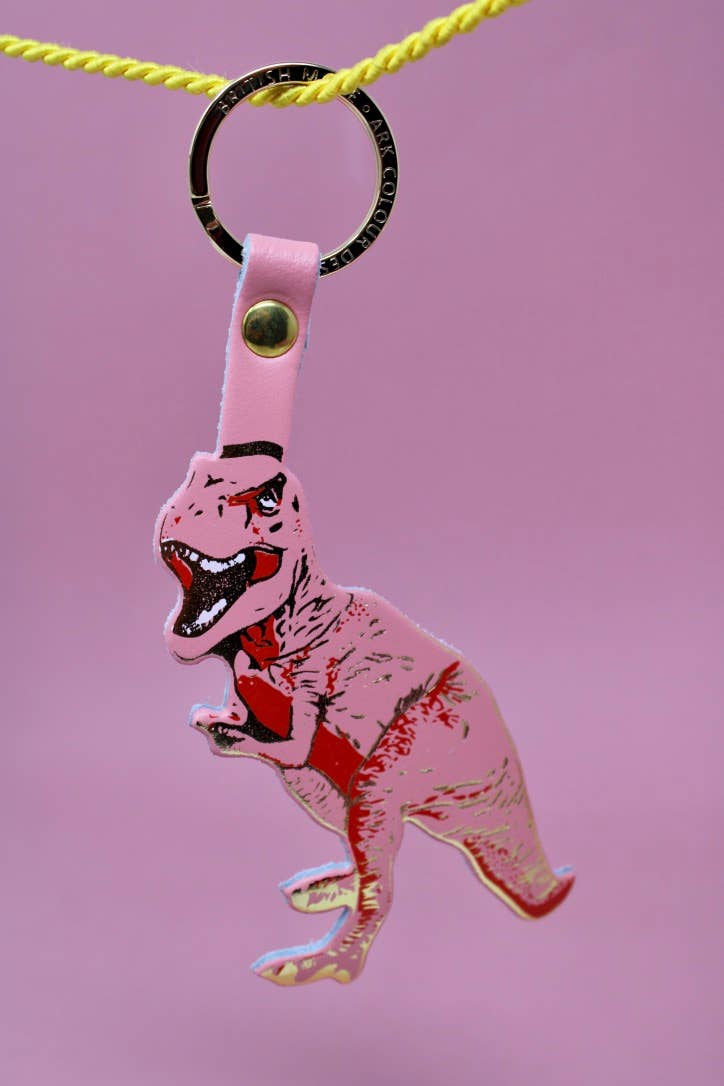 A pre-historic t-rex leather keychain for the fierce dinosaur in your life!