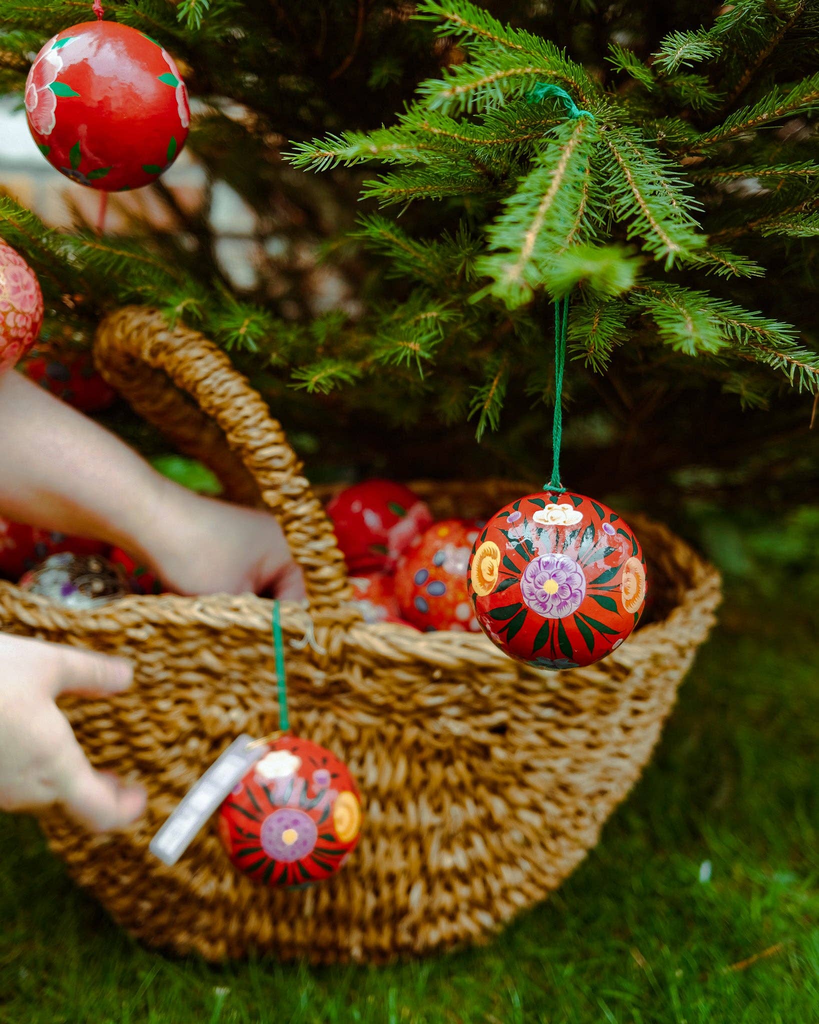 Hand-painted Red Bouquet Bauble by East End Press made from recycled papier mâché with velvet hanging loop