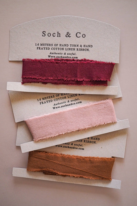 1.4 meters of our hand frayed linen ribbon. Supplied on die cut luxury letter press backing cards.
Available in a selection of colours for luxury gifting.