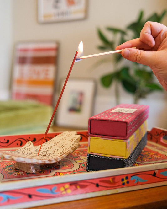Close-up of Love frankincense incense stick burning with low smoke