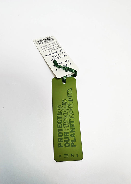 Close up of green recycled leather texture and ribbon