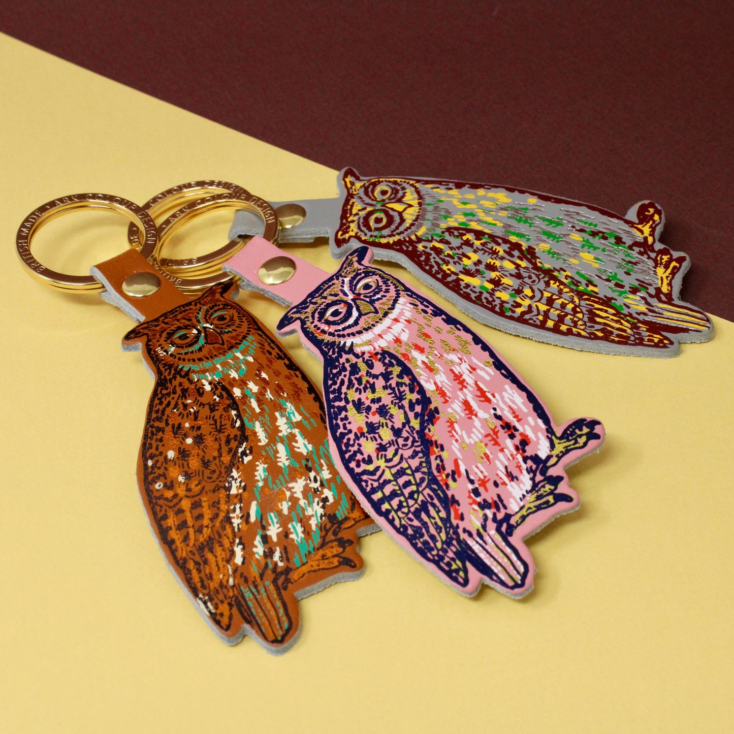 Nocturnal owl leather key fob handmade in Scotland, with gold-plated ring and hot foil embossed design by Ark Colour Design