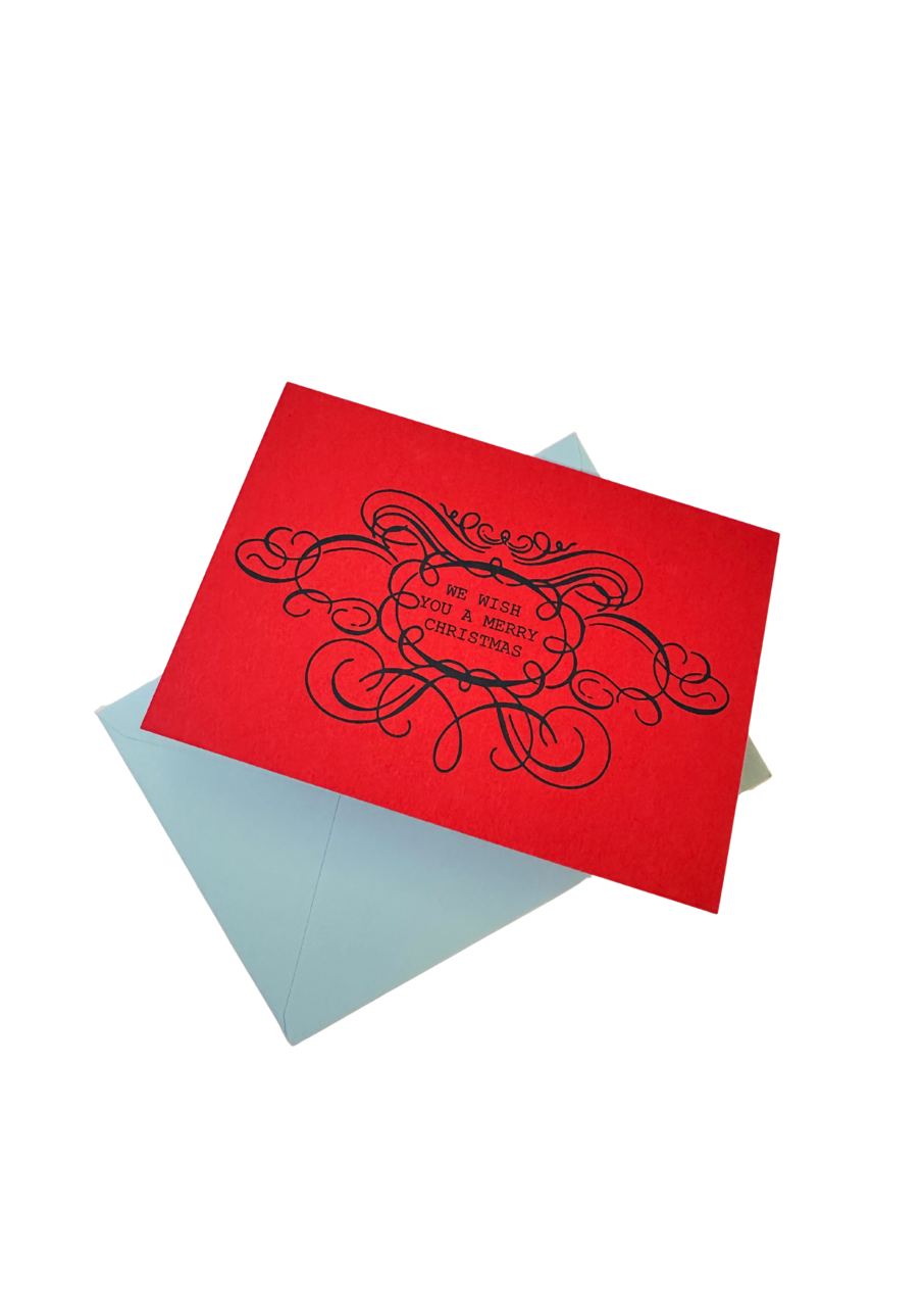 We Wish You a Merry Christmas letterpress red card by Soch and Co.—A6 size, textured, blank inside, with envelope in biodegradable cello packaging.