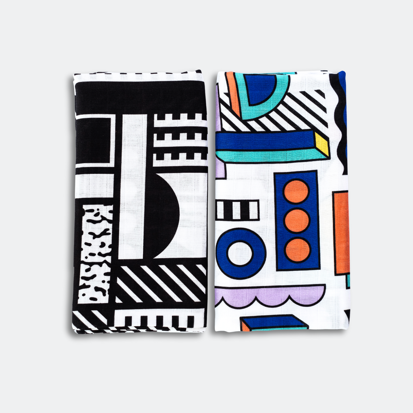 Pair of large sensory muslin squares featuring bold high-contrast designs by Camille Walala for Etta Loves, made from 100% organic cotton, suitable from 0–12 months.