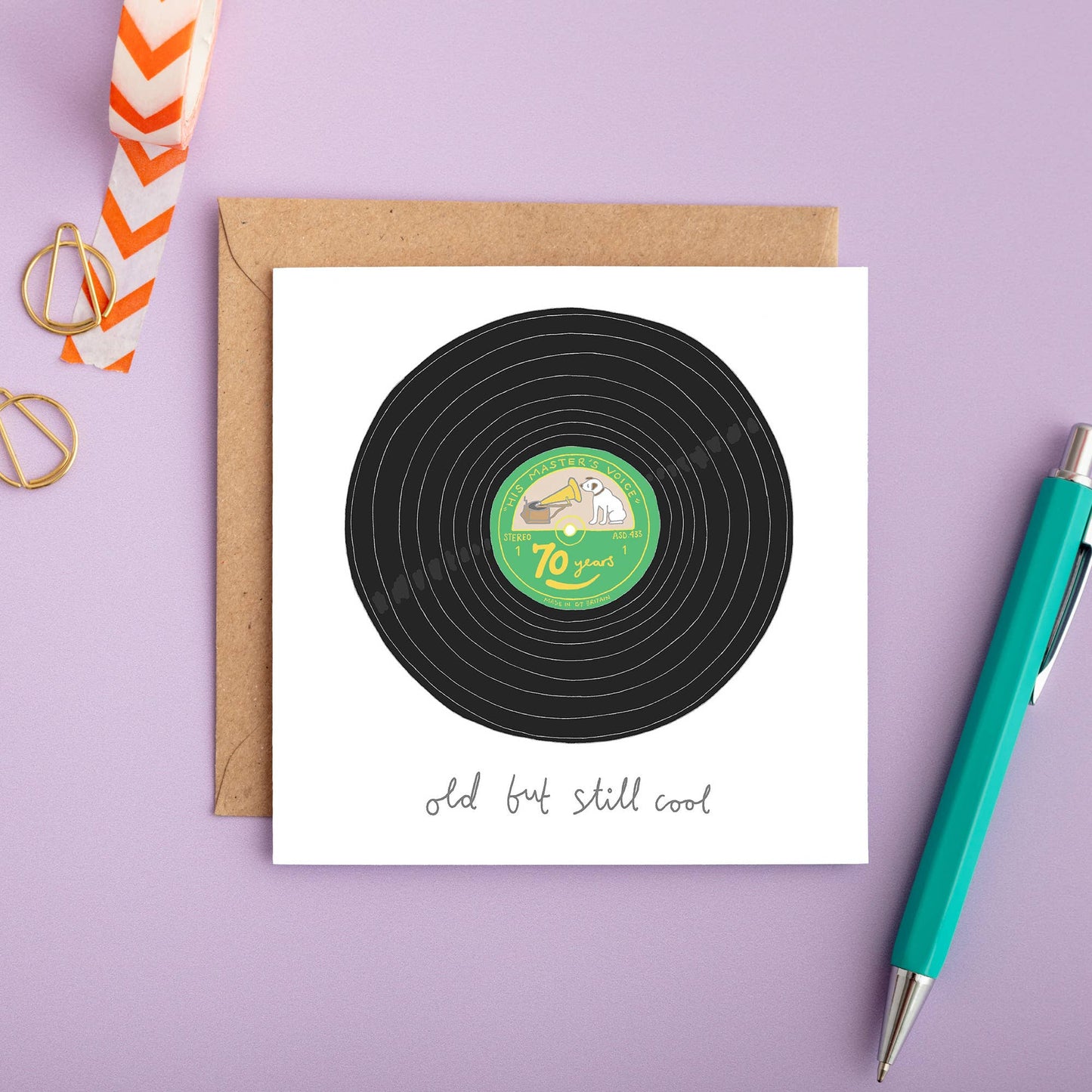 Featuring a hand-drawn illustration of a vinyl record, this witty card celebrates turning 70 with style and humour. The message on the front, written in a playful, hand-drawn font, reads "70 years, Old but Still Cool," making it the perfect choice for music lovers or anyone with a timeless sense of cool.