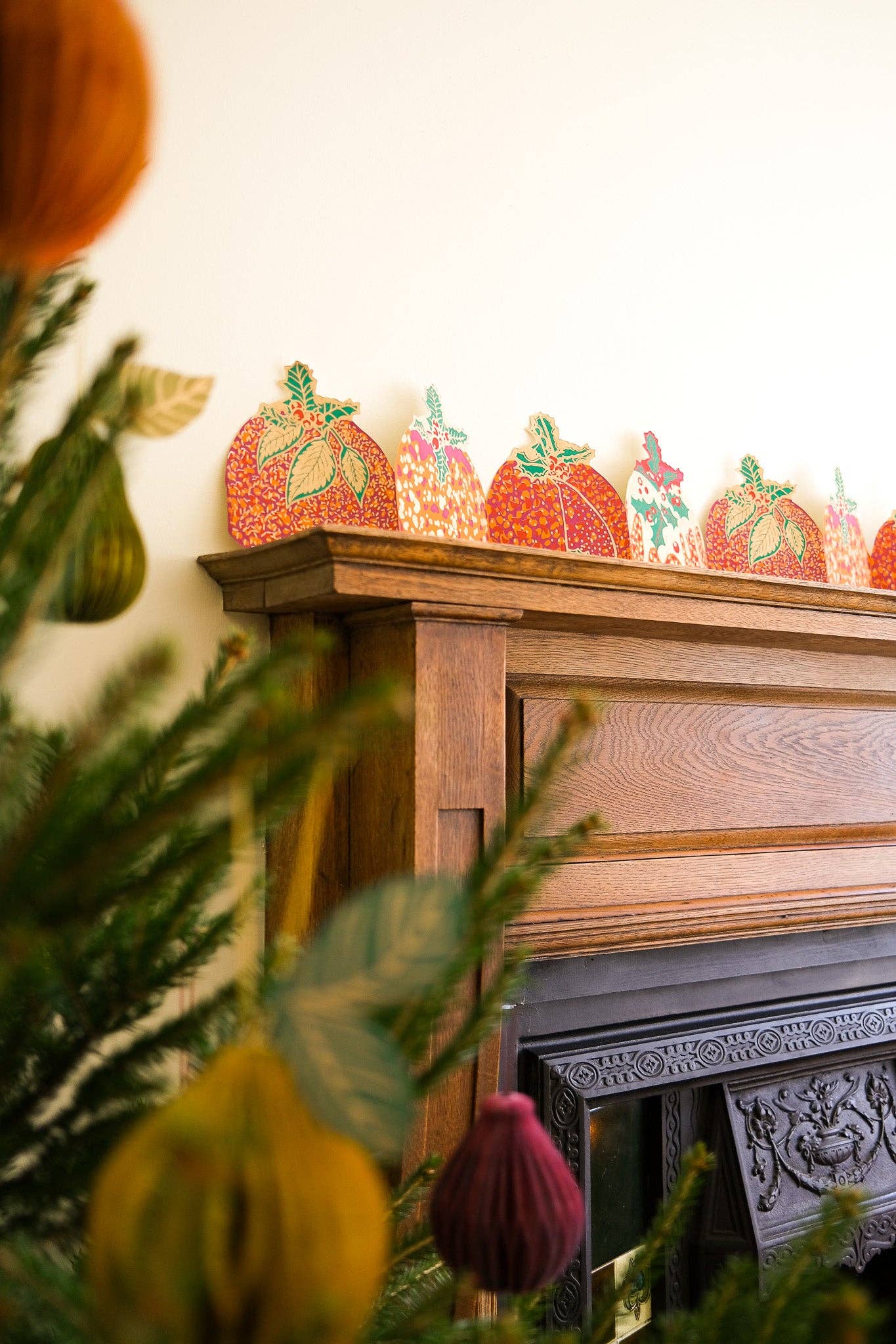 Hand-printed recycled paper Christmas Puddings Concertina Garland by East End Press, 3 metres long