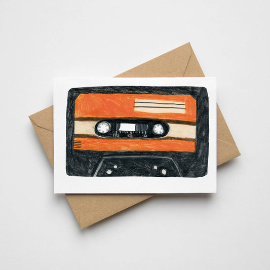 Retro mini cassette tape greeting card on a plain background, showing the front design and the included kraft envelope.