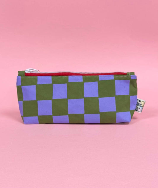 Artisanal handprinted design on waxed cotton pouch