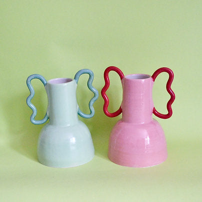 Close-up of the distinctive wiggle handles on the Mint Green Ceramic Vase