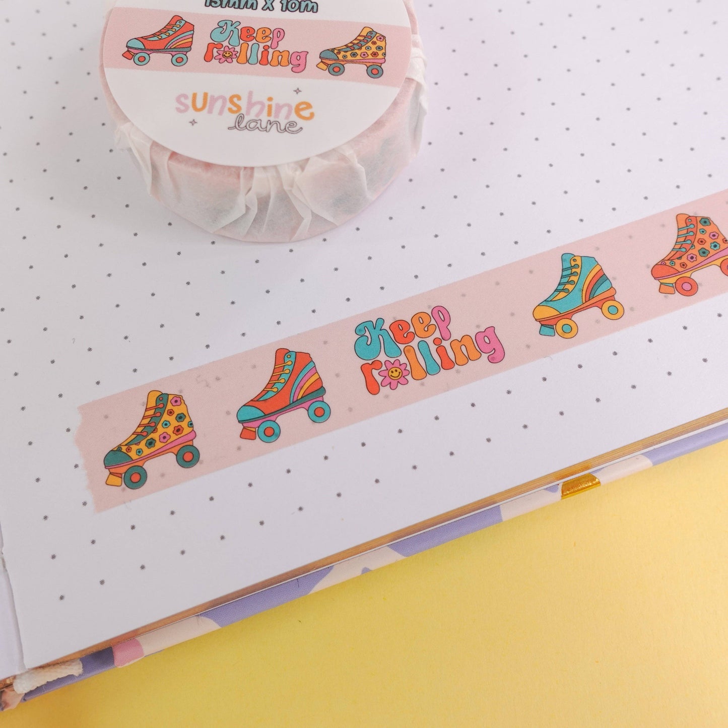 Funky washi tape with roller skate design and “Keep Rolling” message, 15mm x 10m roll, wrapped in eco-friendly paper—perfect for creative stationery and craft projects.