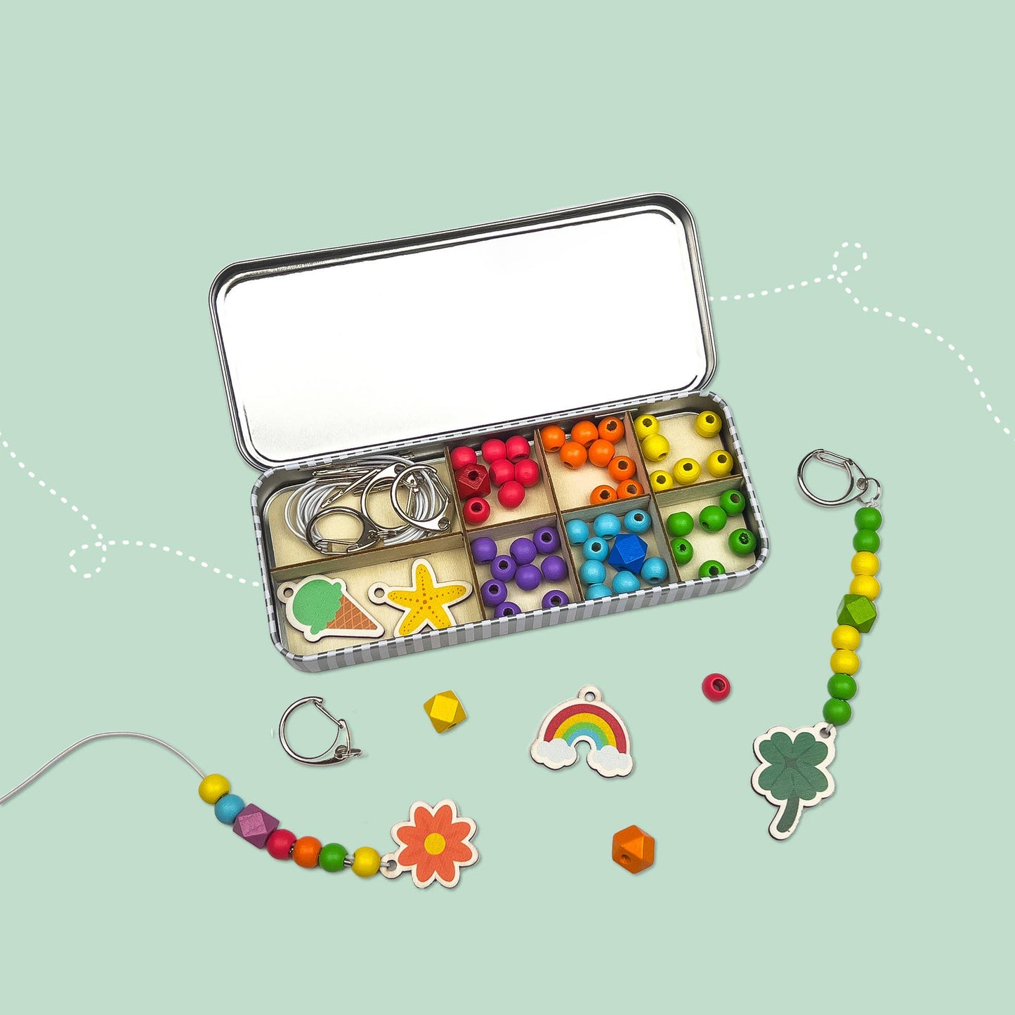 The Lucky Dip Keyring making kit is a wonderful plastic free activity. It offers a selection of wooden fobs to include a clover, flower, starfish, ice cream & a rainbow, allowing children to create 5 keyrings. The kit also comes with rainbow coloured spacer geometric beads to complement the showpiece beads for vibrant accessories!