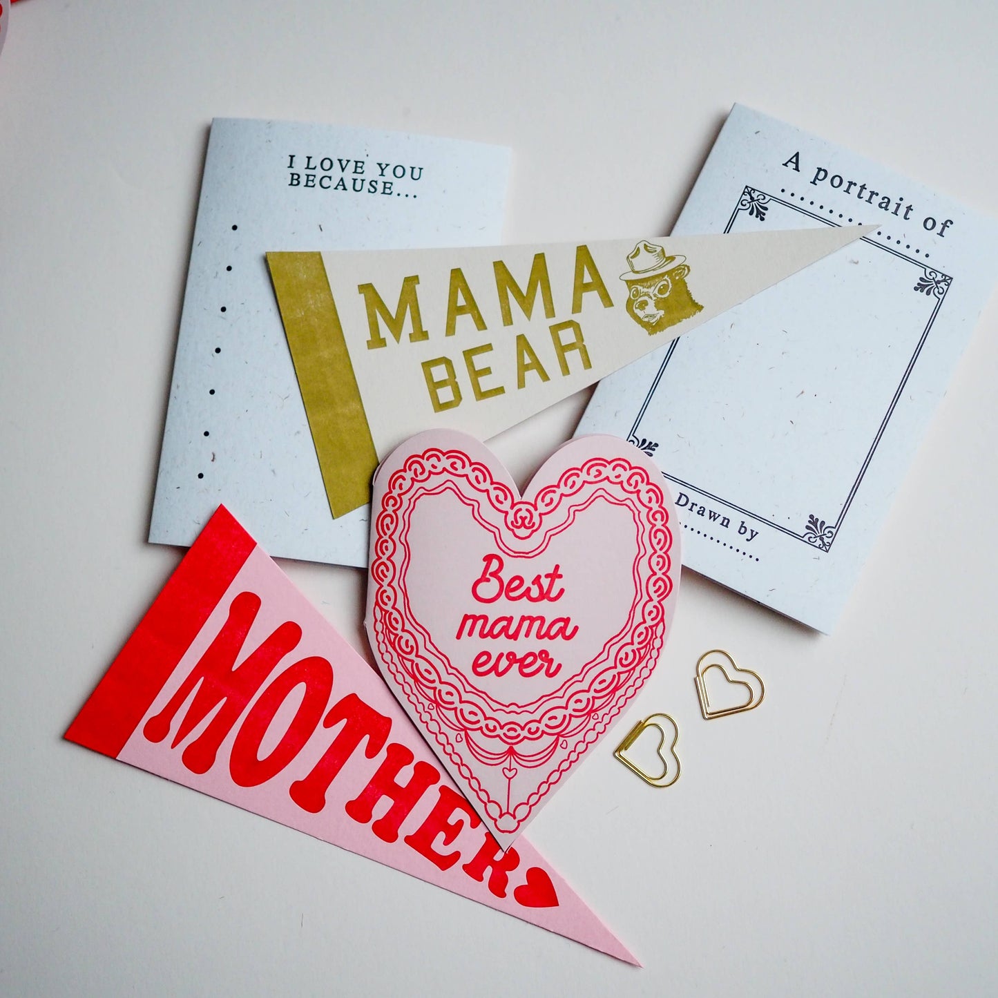 A letter press greeting card featuring a hand drawn retro cake and the words Best Mama ever. Perfect for Mothers Day , new mums & just because. Letter press printed ; die cut on an antique machines.