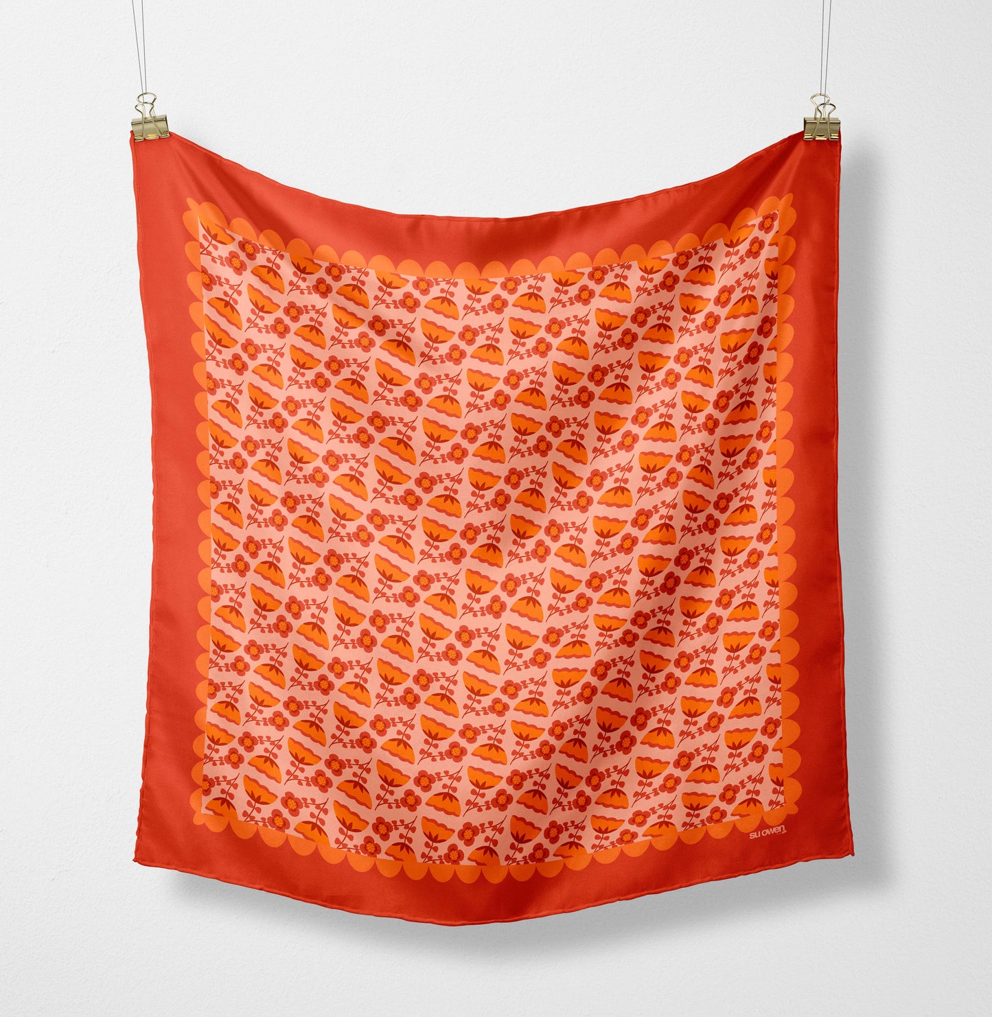 Eco silk twill pocket square with orange folk flower pattern and scalloped border, cottagecore style. Made from recycled polyester and designed by Su Owen.