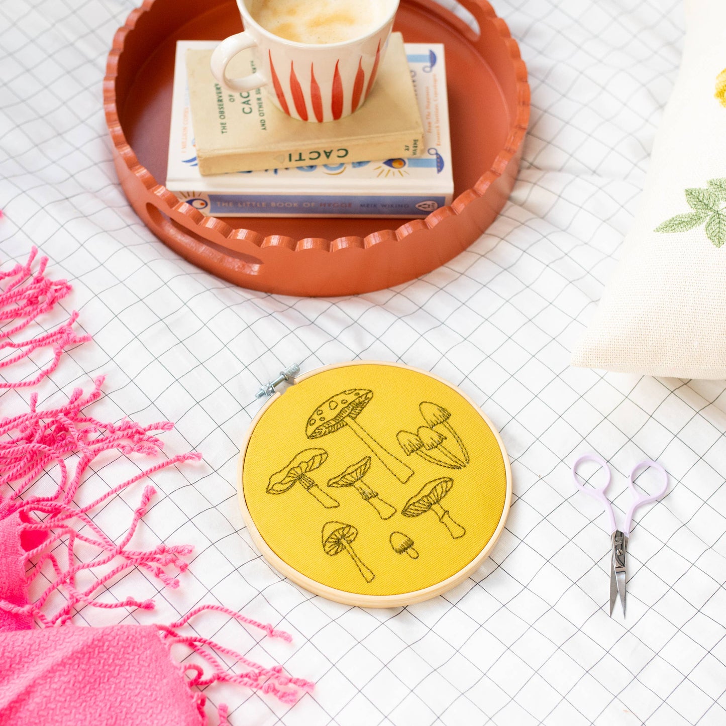 Yellow Fungi Embroidery Hoop Kit Kit by Cotton Clara. Featuring seven different fungi's in black thread to embroider.